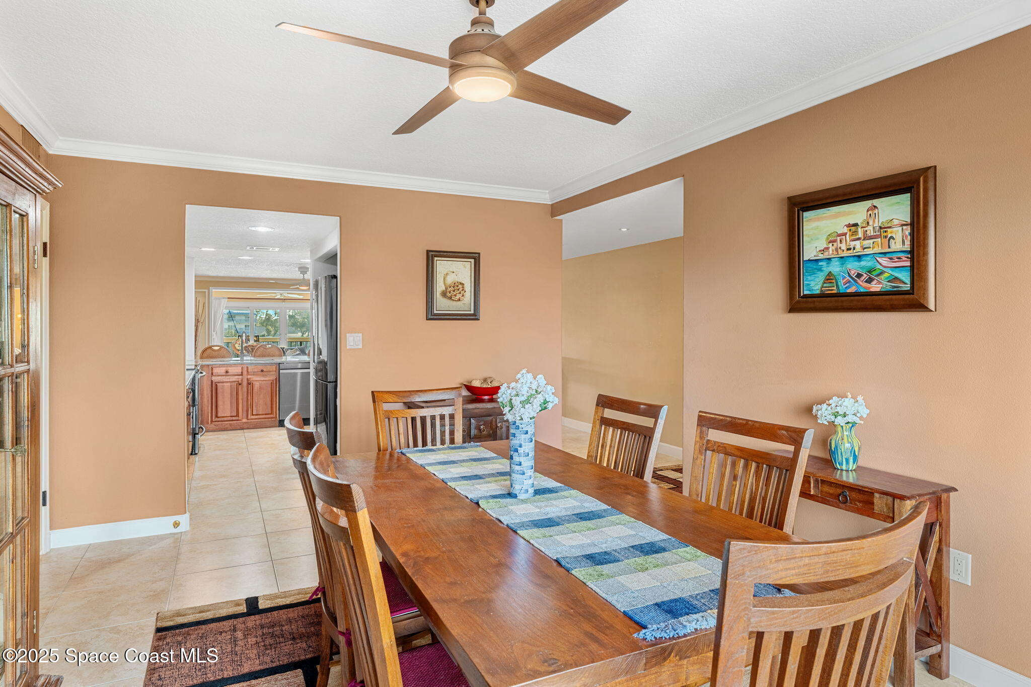 2220 Front Street, Unit 404 Melbourne, FL 32901 - Photo 12 of 52 a dining room with furniture and wooden floor