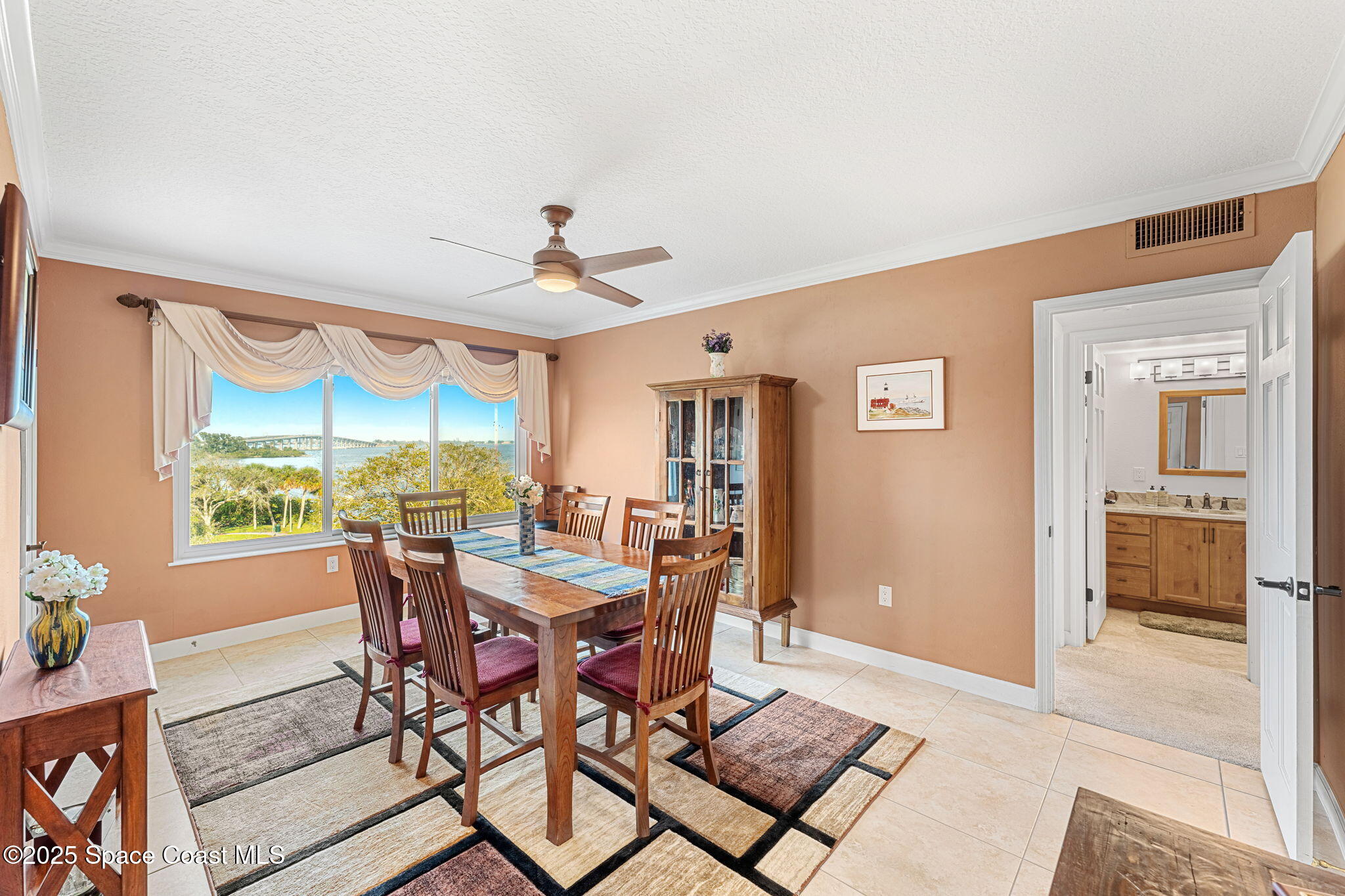 2220 Front Street, Unit 404 Melbourne, FL 32901 - Photo 13 of 52 a view of a dining room with furniture window and outside view