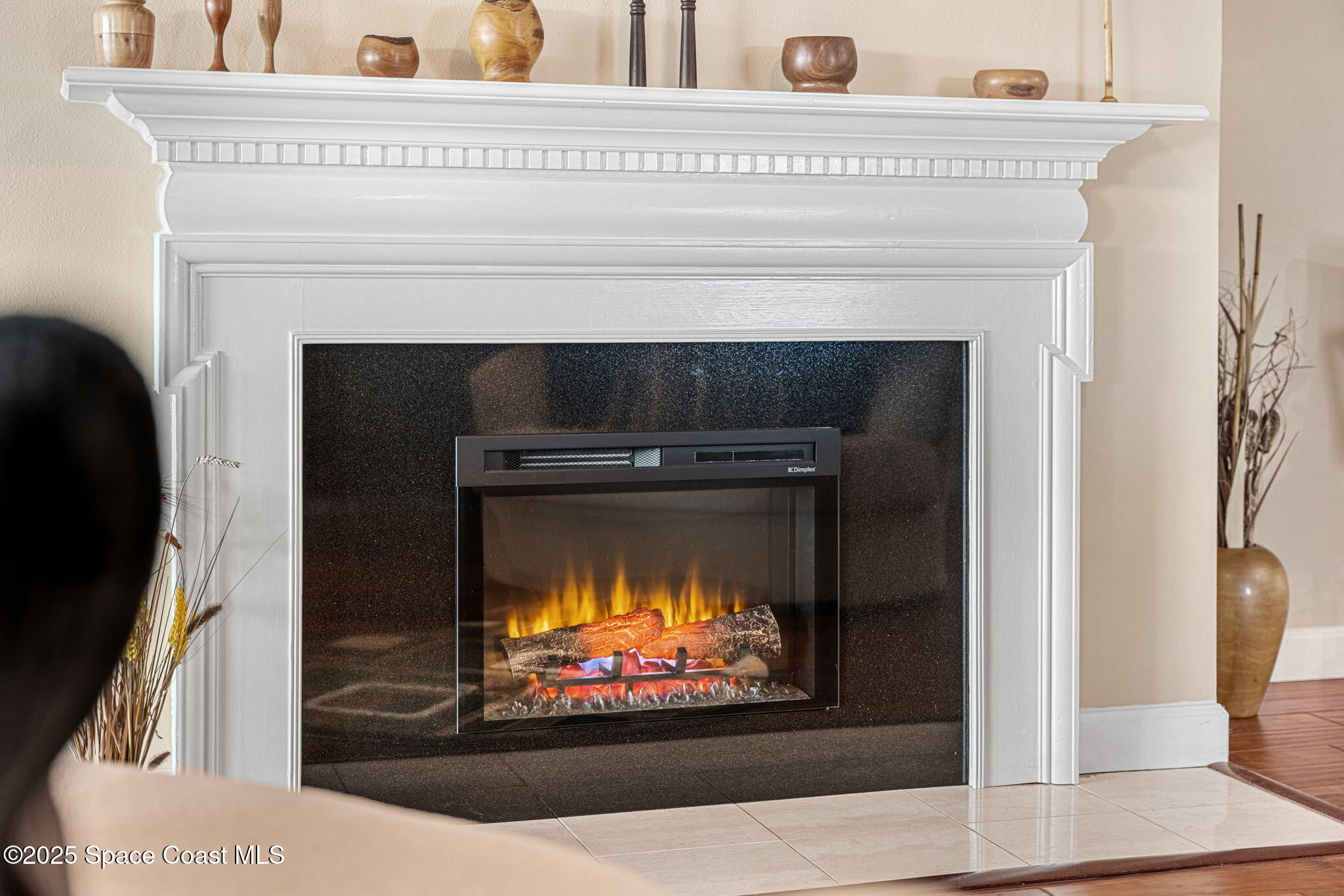 2220 Front Street, Unit 404 Melbourne, FL 32901 - Photo 28 of 52 a living room with a fireplace