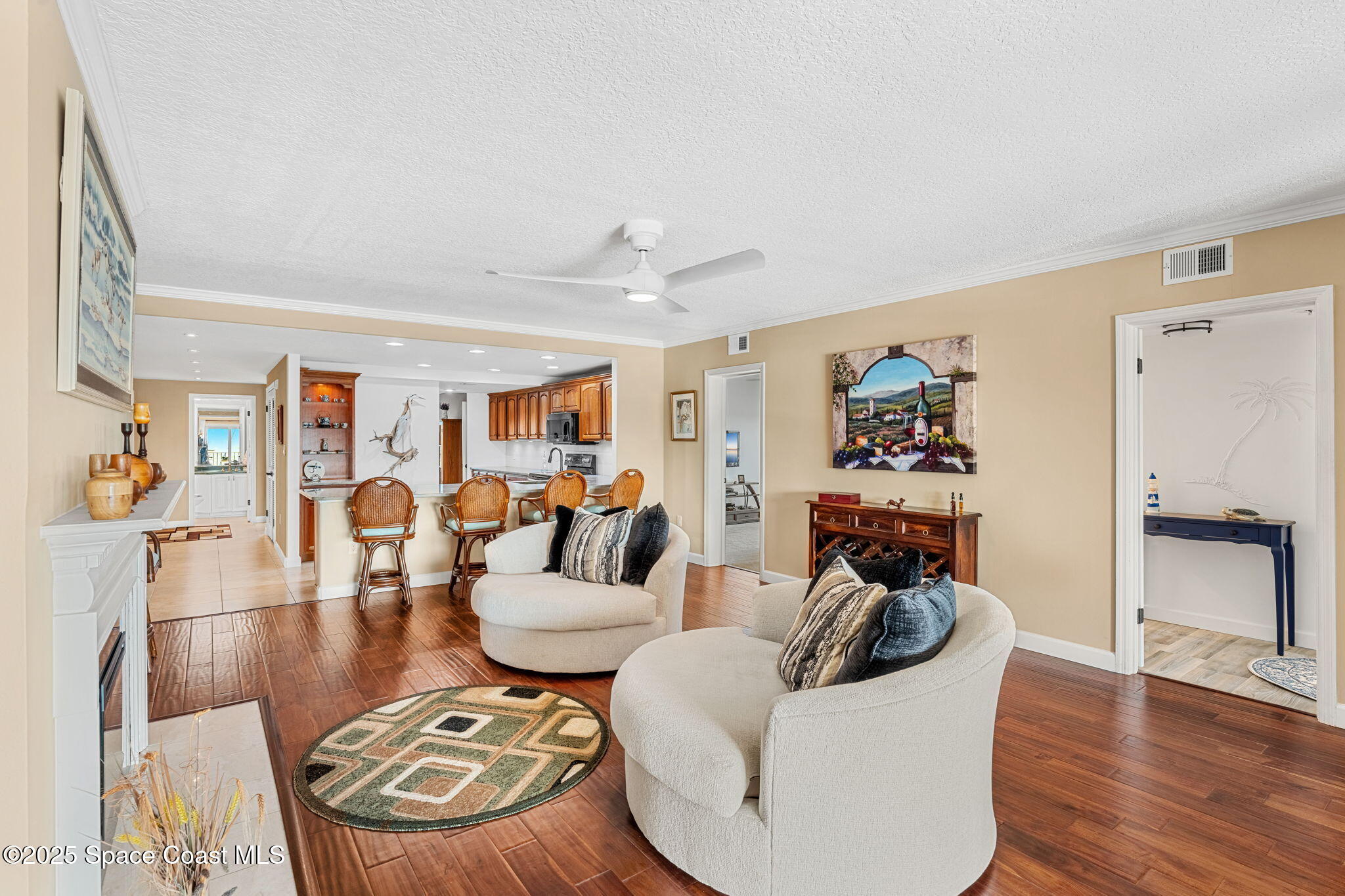 2220 Front Street, Unit 404 Melbourne, FL 32901 - Photo 29 of 52 a living room with furniture and wooden floor