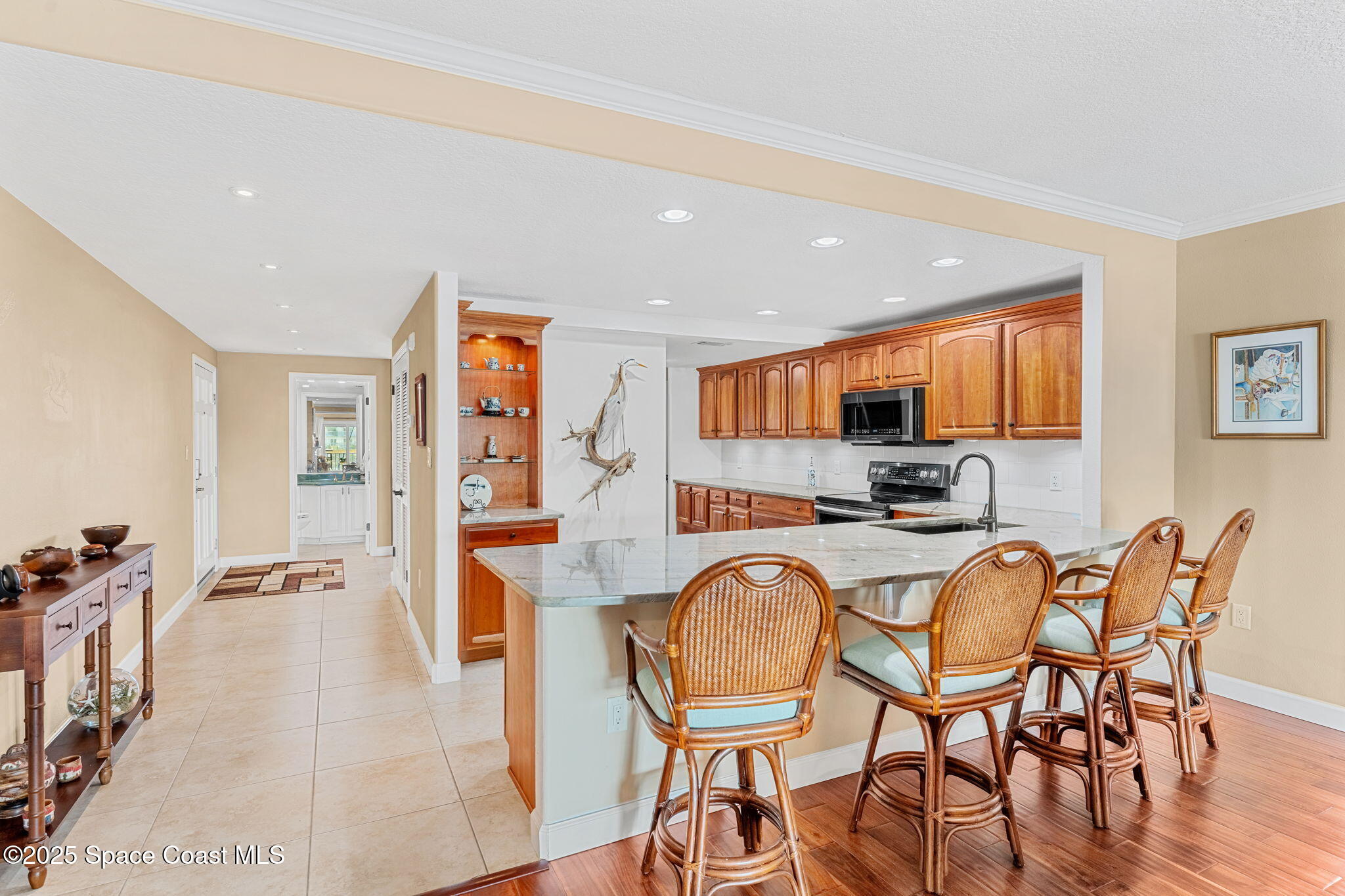 2220 Front Street, Unit 404 Melbourne, FL 32901 - Photo 8 of 52 a view of a dining room with furniture