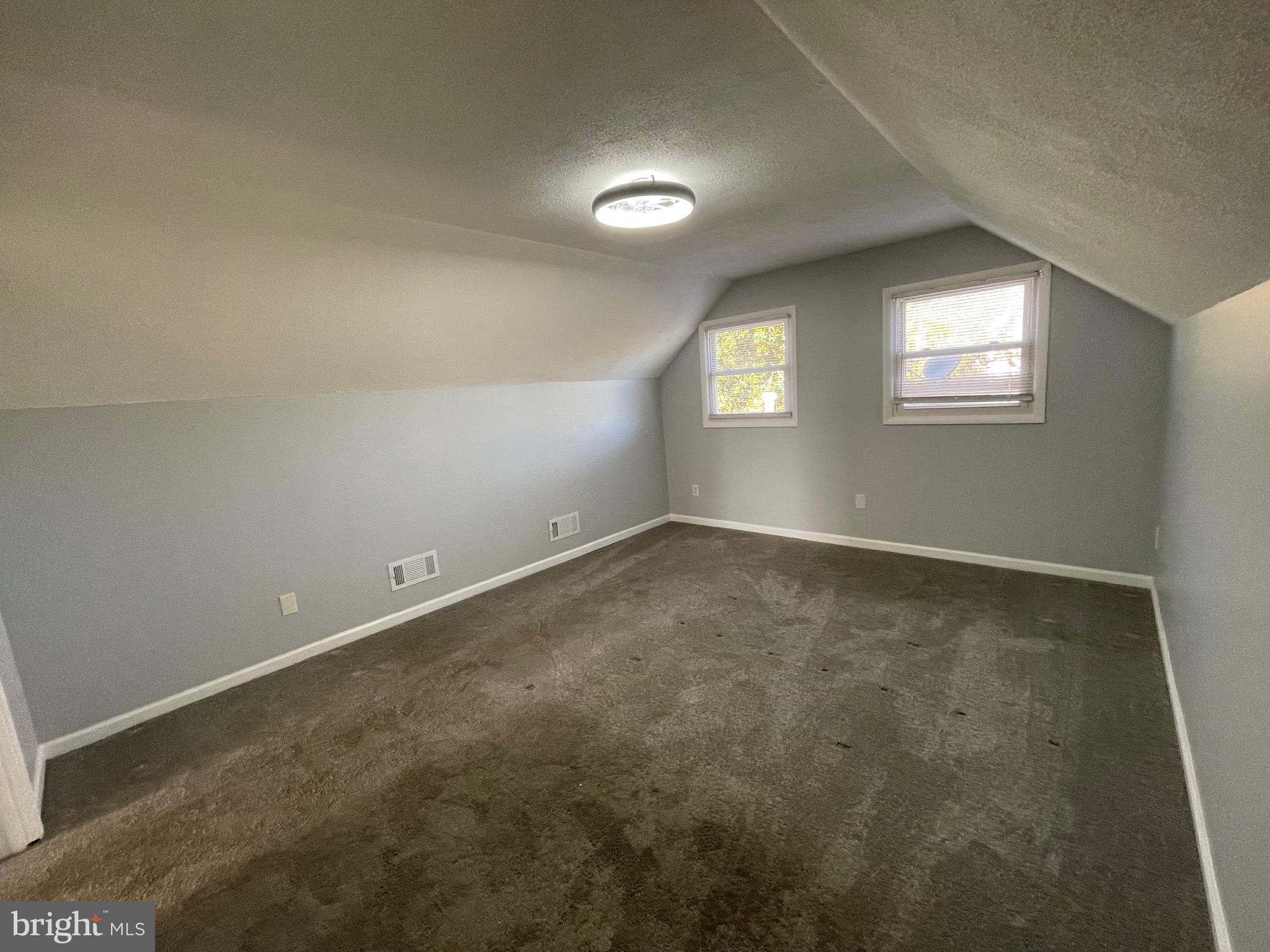 229 Garner Avenue Waldorf, MD 20602 - Photo 24 of 25 an empty room with a empty space and windows