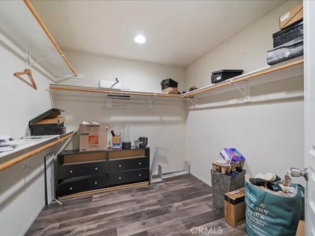 a room with a cabinets and wooden floor