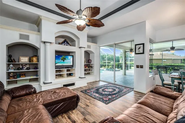 a bedroom with furniture and a window