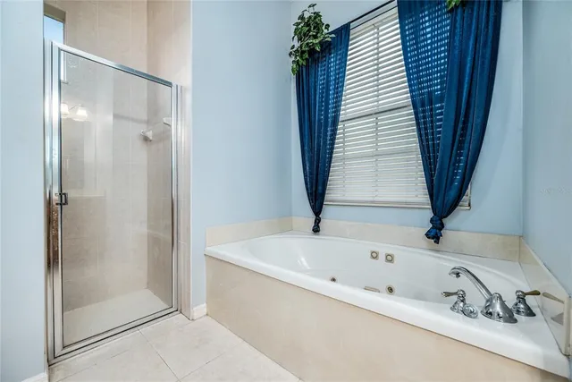 a bathroom with a sink double vanity and a mirror