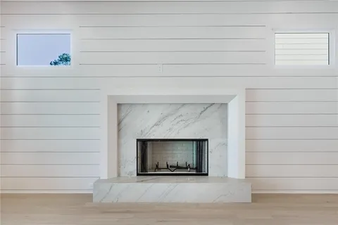 a white building with a fireplace