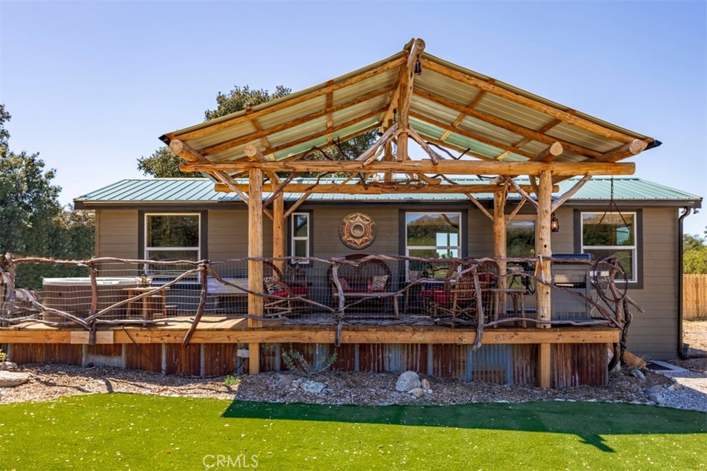 30415 Chihuahua Valley Road Warner Springs, CA 92086 - Photo 14 of 75 a view of a cafe with a couple of people seating on table and chairs