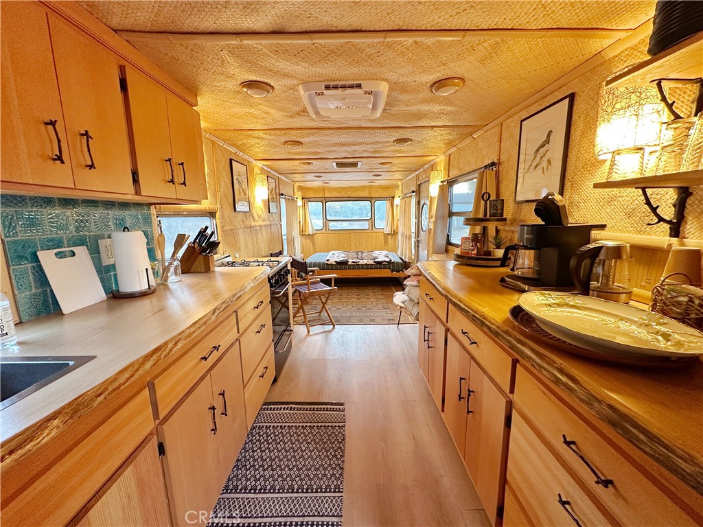 30415 Chihuahua Valley Road Warner Springs, CA 92086 - Photo 26 of 75 a view of a kitchen with kitchen island granite countertop lots of counter top space