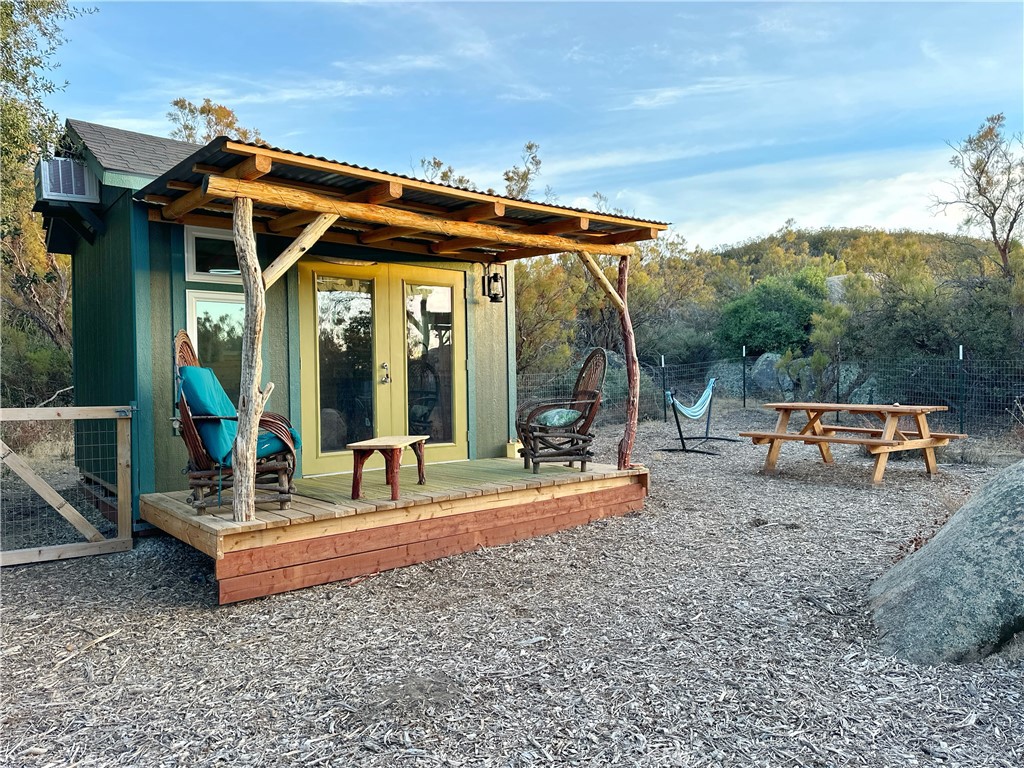 30415 Chihuahua Valley Road Warner Springs, CA 92086 - Photo 38 of 75 a view of a park with chairs and wooden fence