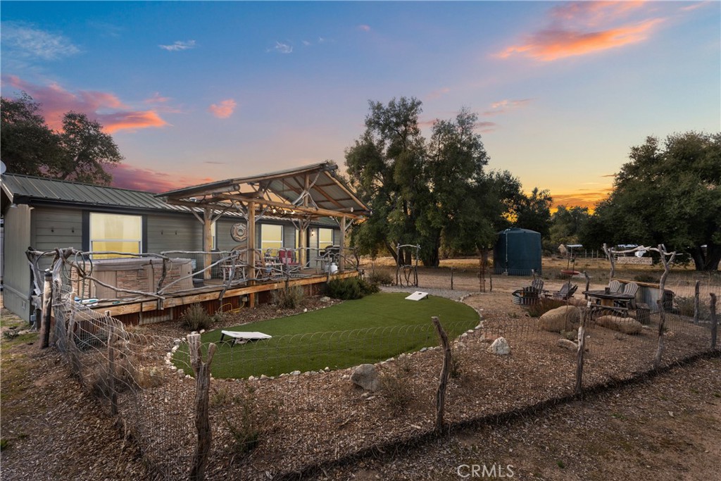 30415 Chihuahua Valley Road Warner Springs, CA 92086 - Photo 41 of 75 a view of a house with backyard and sitting area