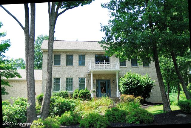 103 Kelly Road Stroudsburg, PA 18360 - Photo 1 of 19 a front view of a house with a garden