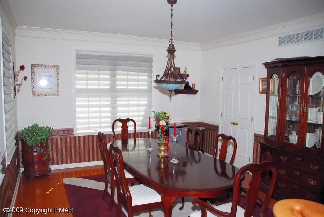 103 Kelly Road Stroudsburg, PA 18360 - Photo 8 of 19 a view of a dining room with furniture window and wooden floor