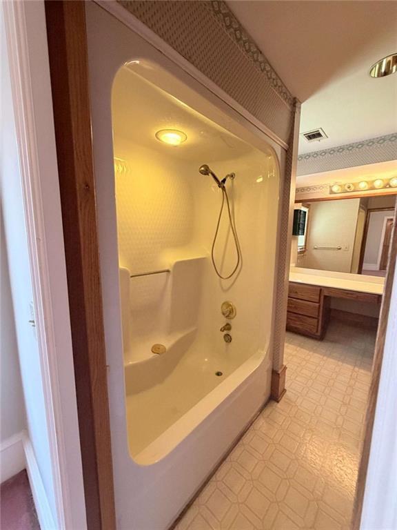 763 McDaniel Mill Road Southwest Conyers, GA 30094 - Photo 45 of 80 a bathroom with a tub and shower