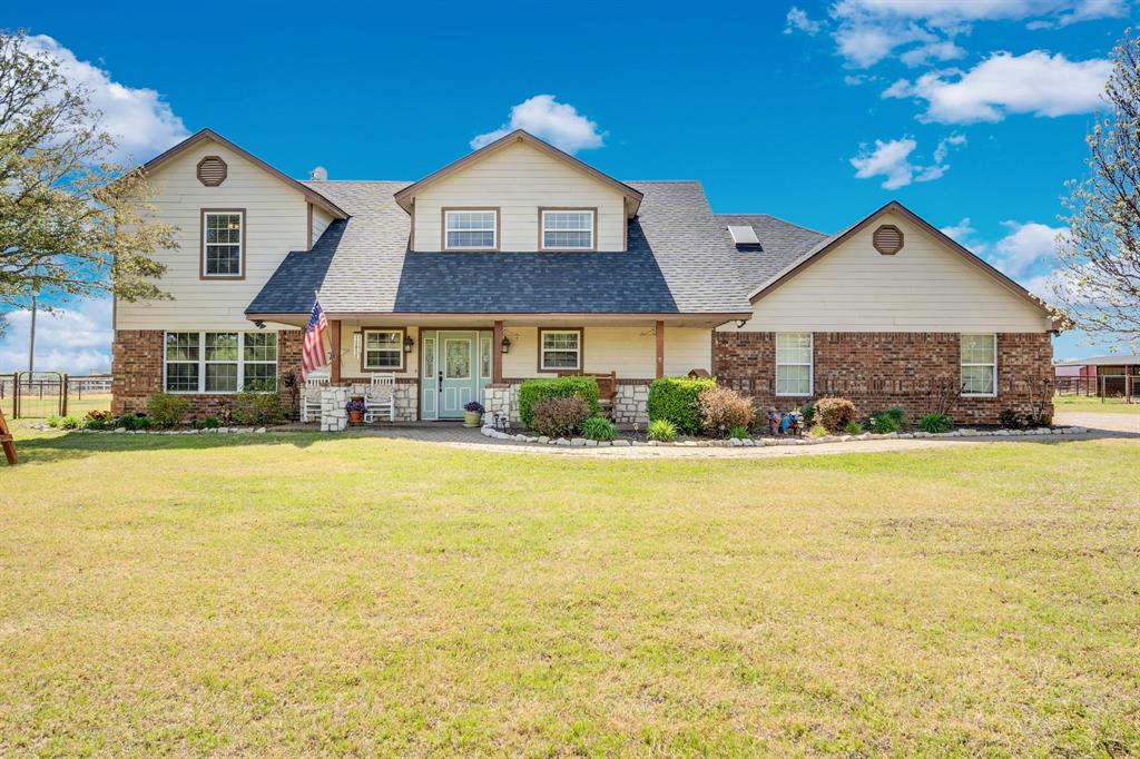 130 Eubanks Road Maypearl, TX 76064 - Photo 36 of 39 a front view of a house with swimming pool