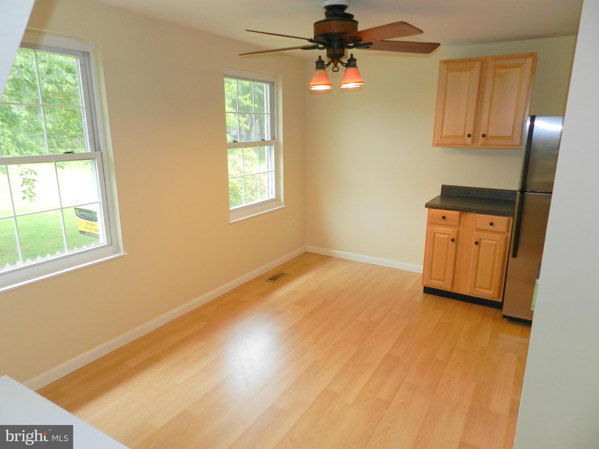 17567 Kohlhoss Road Poolesville, MD 20837 - Photo 11 of 25 a view of an empty room with a window