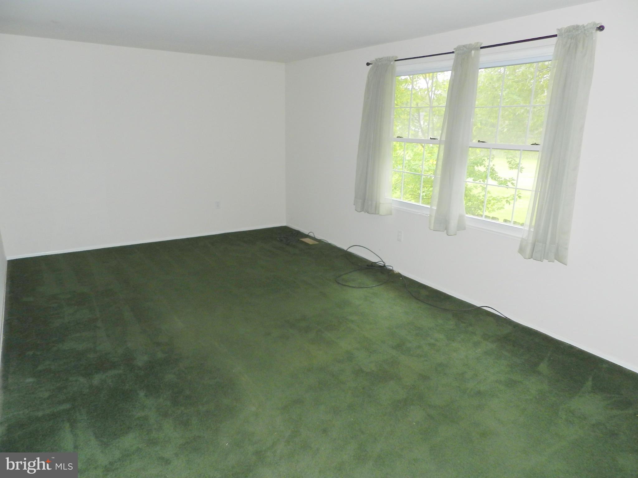 17567 Kohlhoss Road Poolesville, MD 20837 - Photo 12 of 25 a view of an empty room with a window
