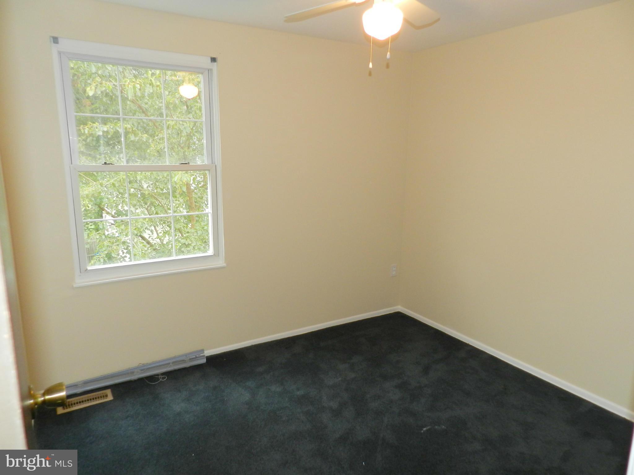 17567 Kohlhoss Road Poolesville, MD 20837 - Photo 19 of 25 an empty room with a window