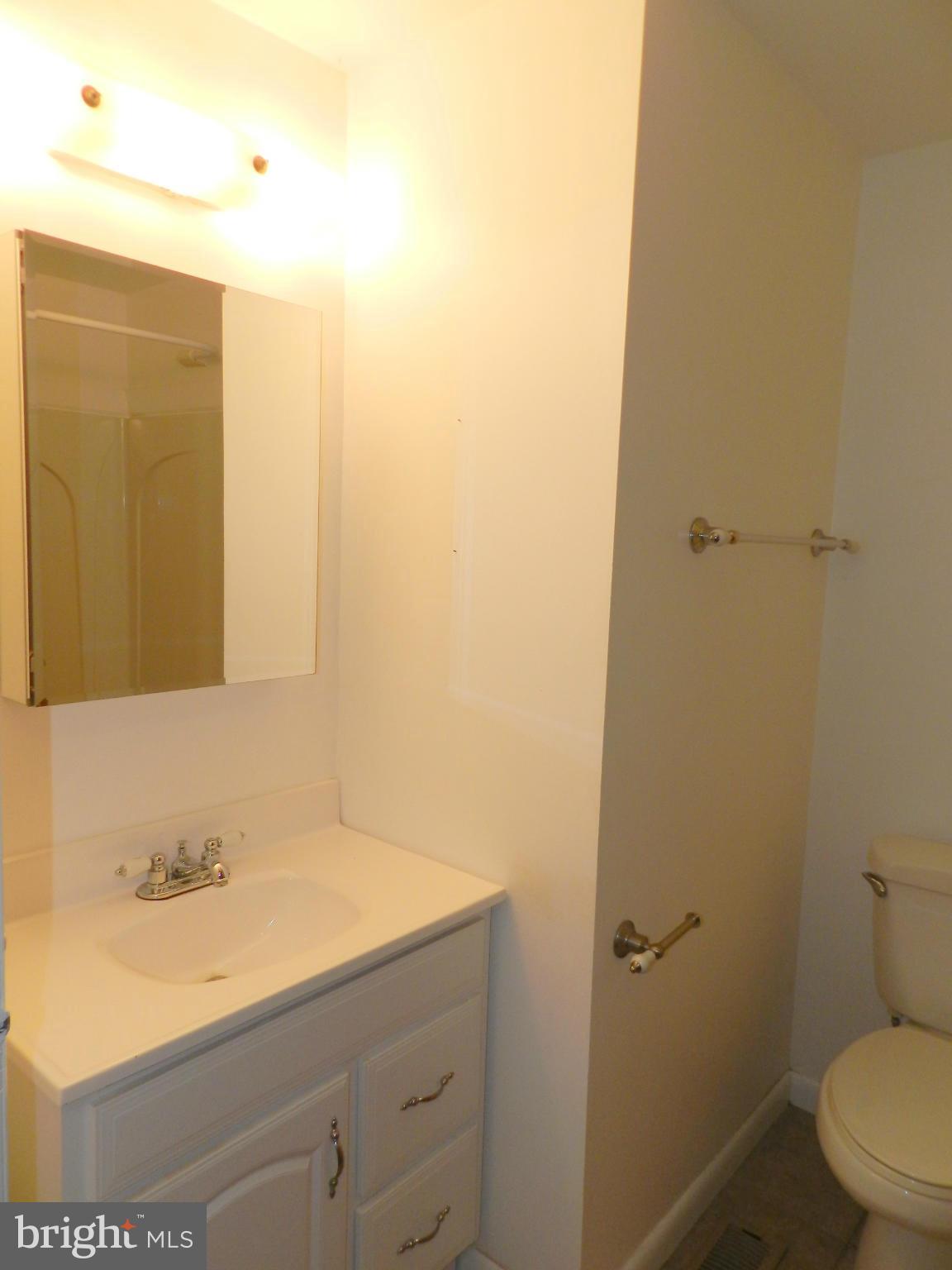 17567 Kohlhoss Road Poolesville, MD 20837 - Photo 21 of 25 a bathroom with a sink and a toilet
