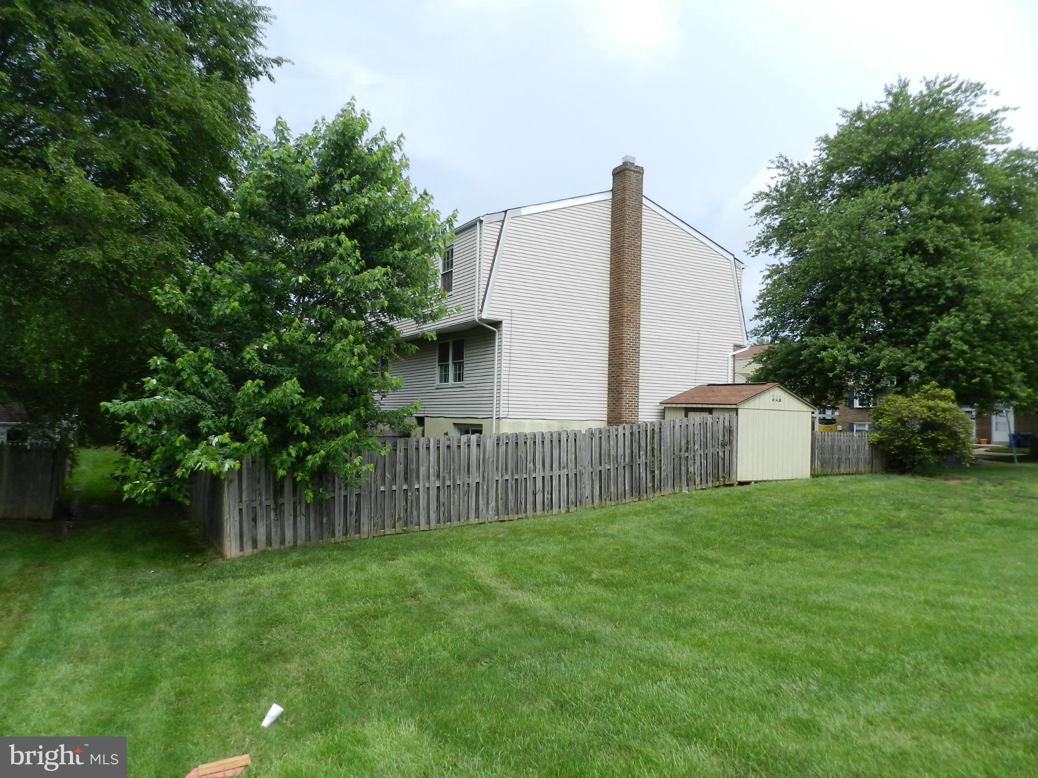 17567 Kohlhoss Road Poolesville, MD 20837 - Photo 4 of 25 a view of a back yard of the house with green space