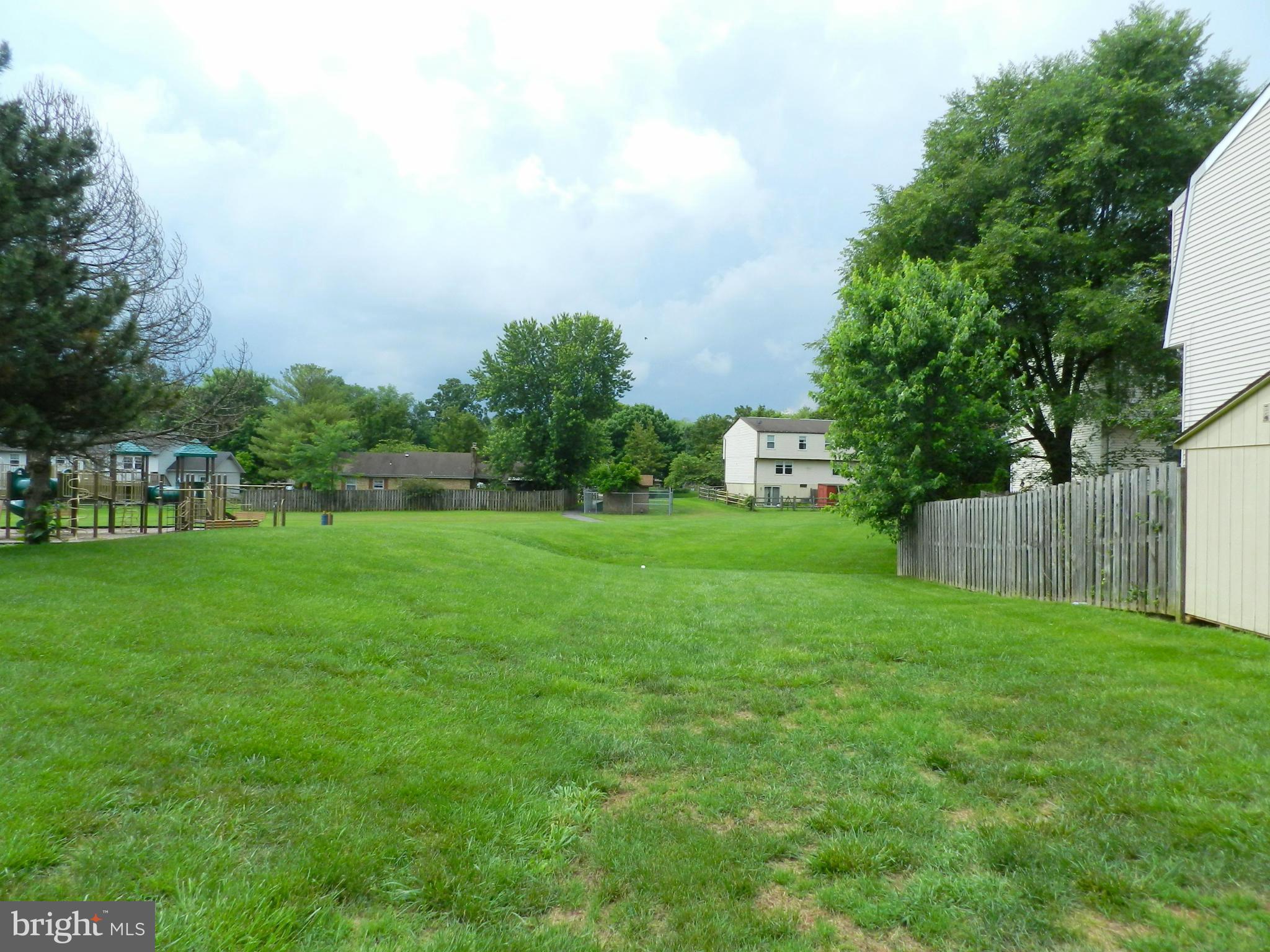 17567 Kohlhoss Road Poolesville, MD 20837 - Photo 9 of 25 a view of a garden with houses