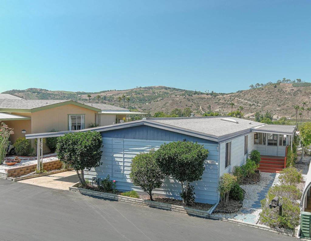 front view of a house with a garden