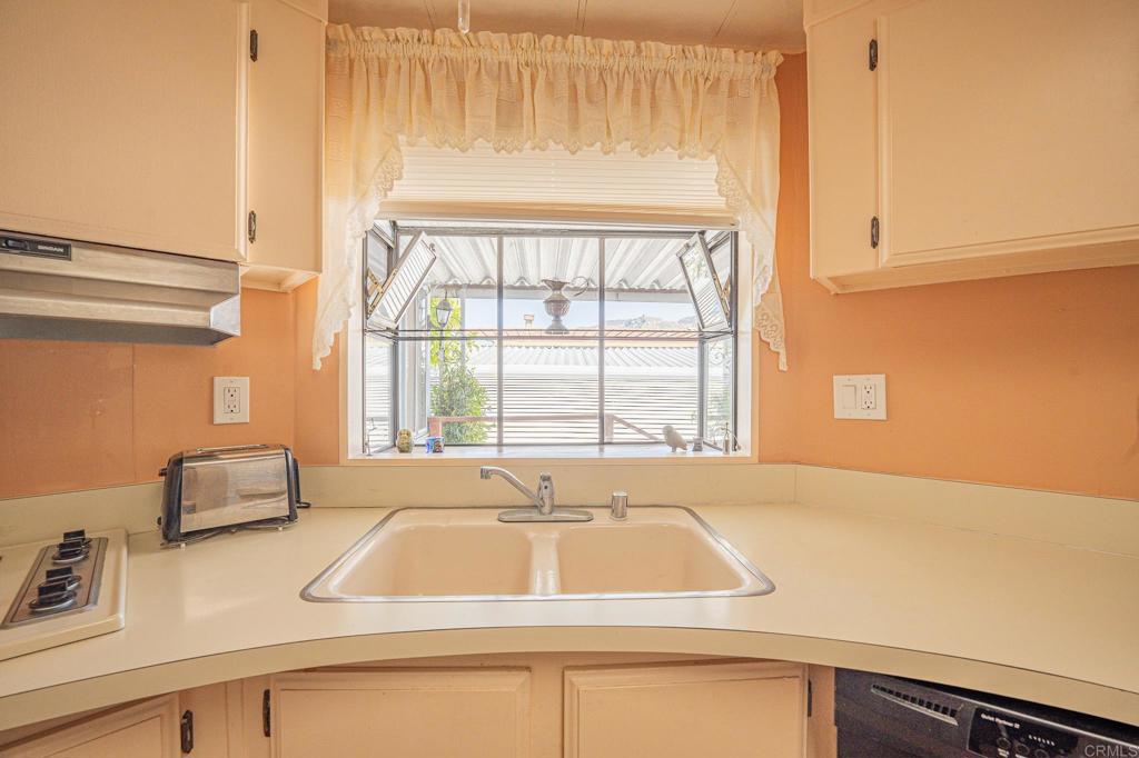 4650 Dulin Road, Unit 120 Fallbrook, CA 92003 - Photo 18 of 34 a kitchen with a sink and a window