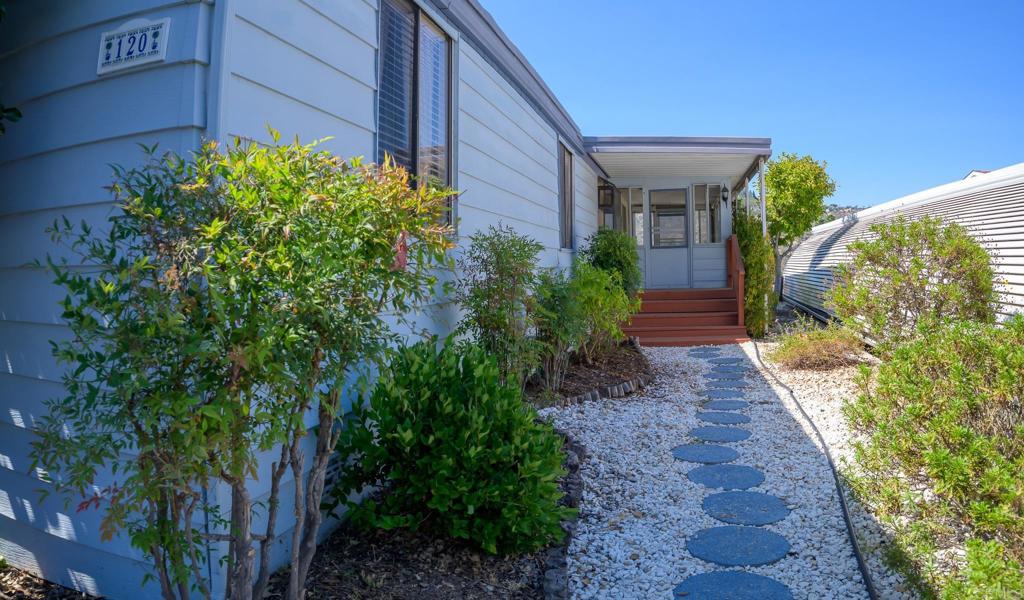 4650 Dulin Road, Unit 120 Fallbrook, CA 92003 - Photo 2 of 34 a view of a pathway with a house