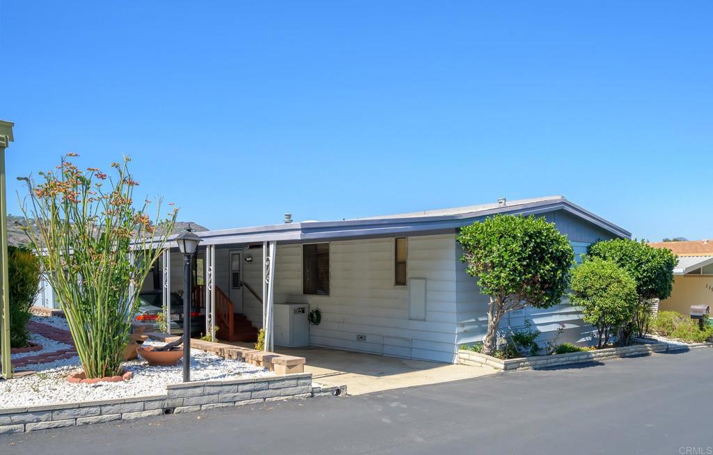 4650 Dulin Road, Unit 120 Fallbrook, CA 92003 - Photo 3 of 34 a couple of table and chairs in front of house