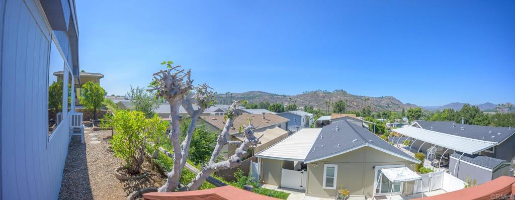 4650 Dulin Road, Unit 120 Fallbrook, CA 92003 - Photo 4 of 34 a view of a house with a yard and sitting area