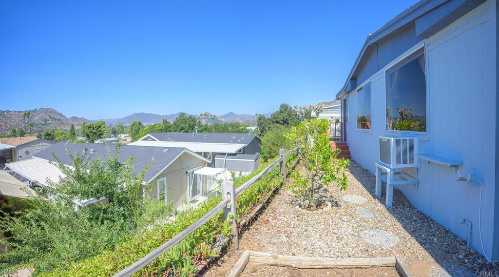 4650 Dulin Road, Unit 120 Fallbrook, CA 92003 - Photo 5 of 34 a view of a house with balcony