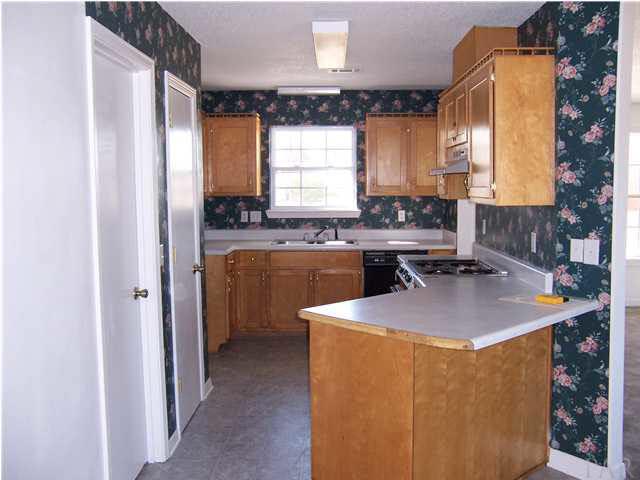 900 Ridge View Lane Pensacola, FL 32514 - Photo 2 of 10 GALLEY STYLE KITCHEN WITH BREAKFAST BAR