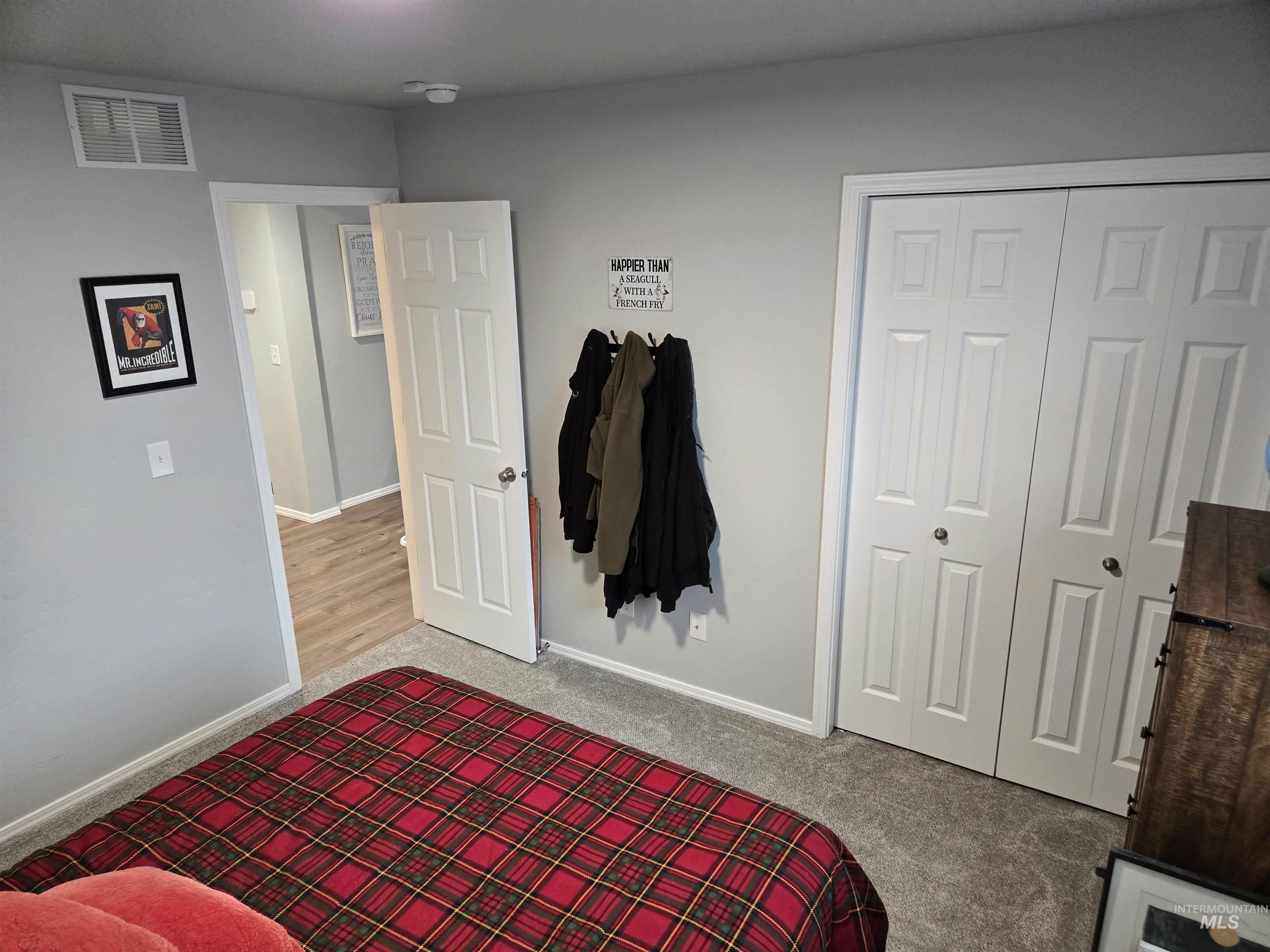 4098 East Mets Street Nampa, ID 83686 - Photo 15 of 34 Carpeted bedroom featuring baseboards and a closet