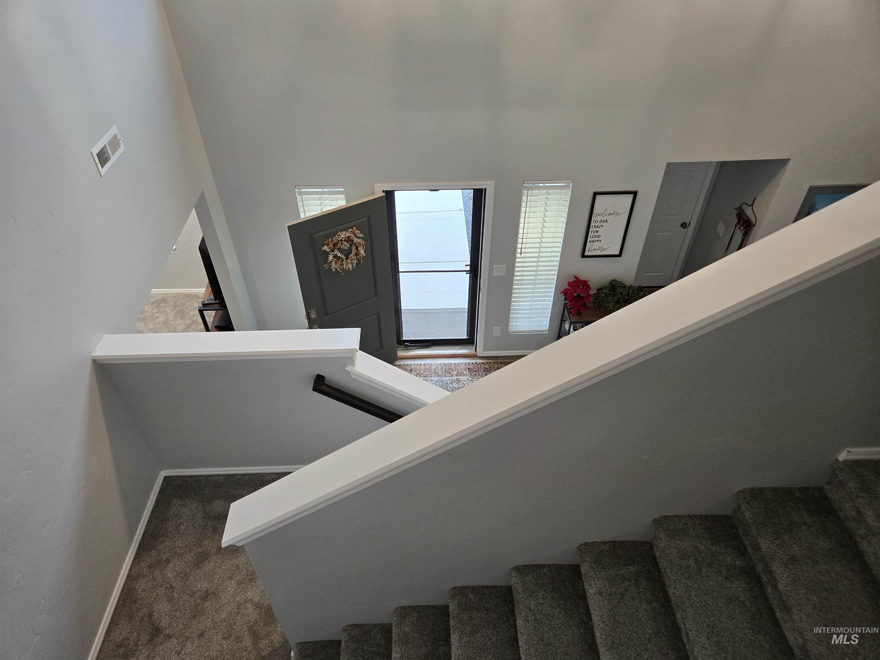 4098 East Mets Street Nampa, ID 83686 - Photo 17 of 34 Stairs featuring baseboards and carpet flooring