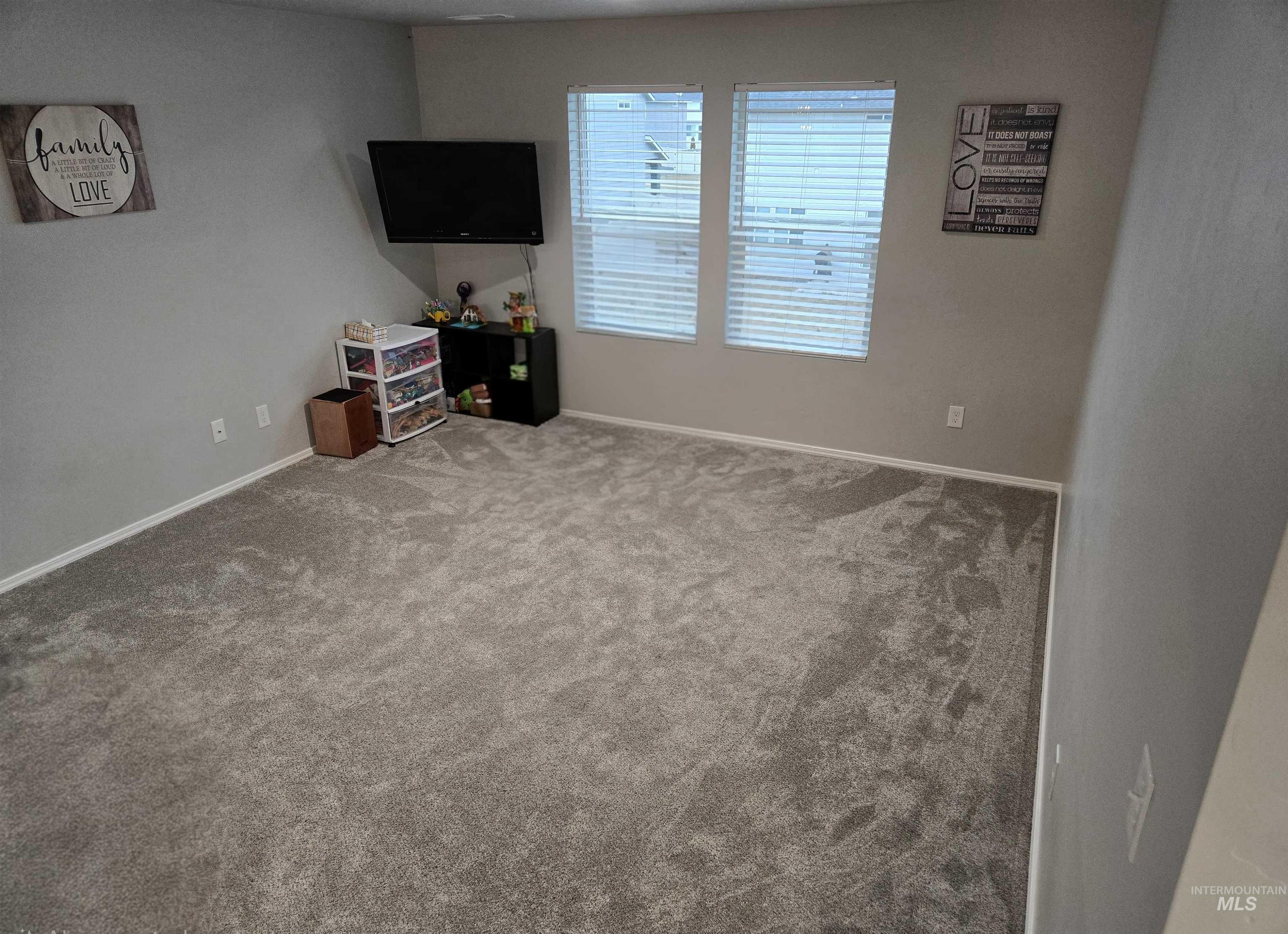 4098 East Mets Street Nampa, ID 83686 - Photo 18 of 34 Recreation room featuring baseboards and carpet floors