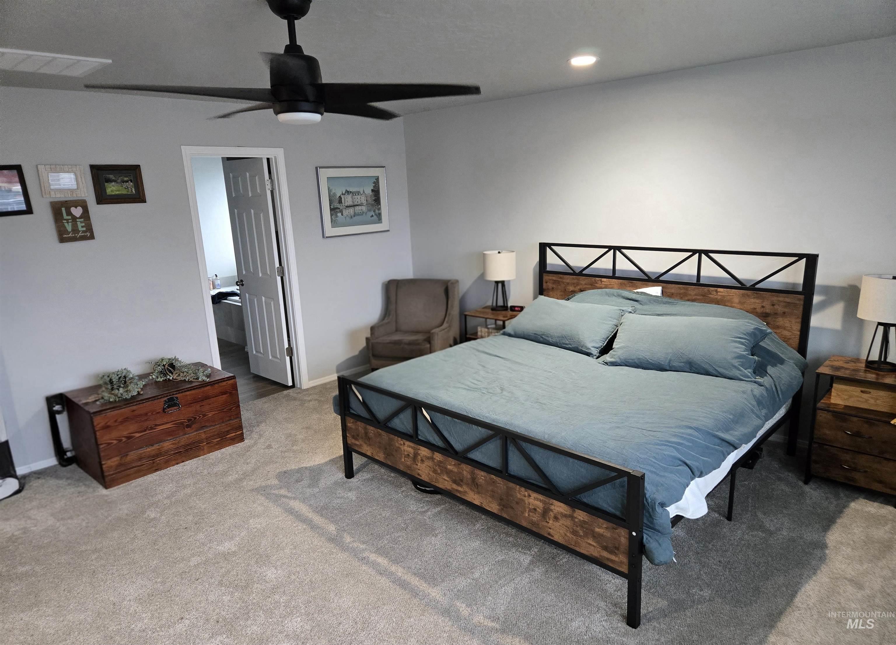 4098 East Mets Street Nampa, ID 83686 - Photo 20 of 34 Bedroom featuring a ceiling fan, light carpet, and recessed lighting