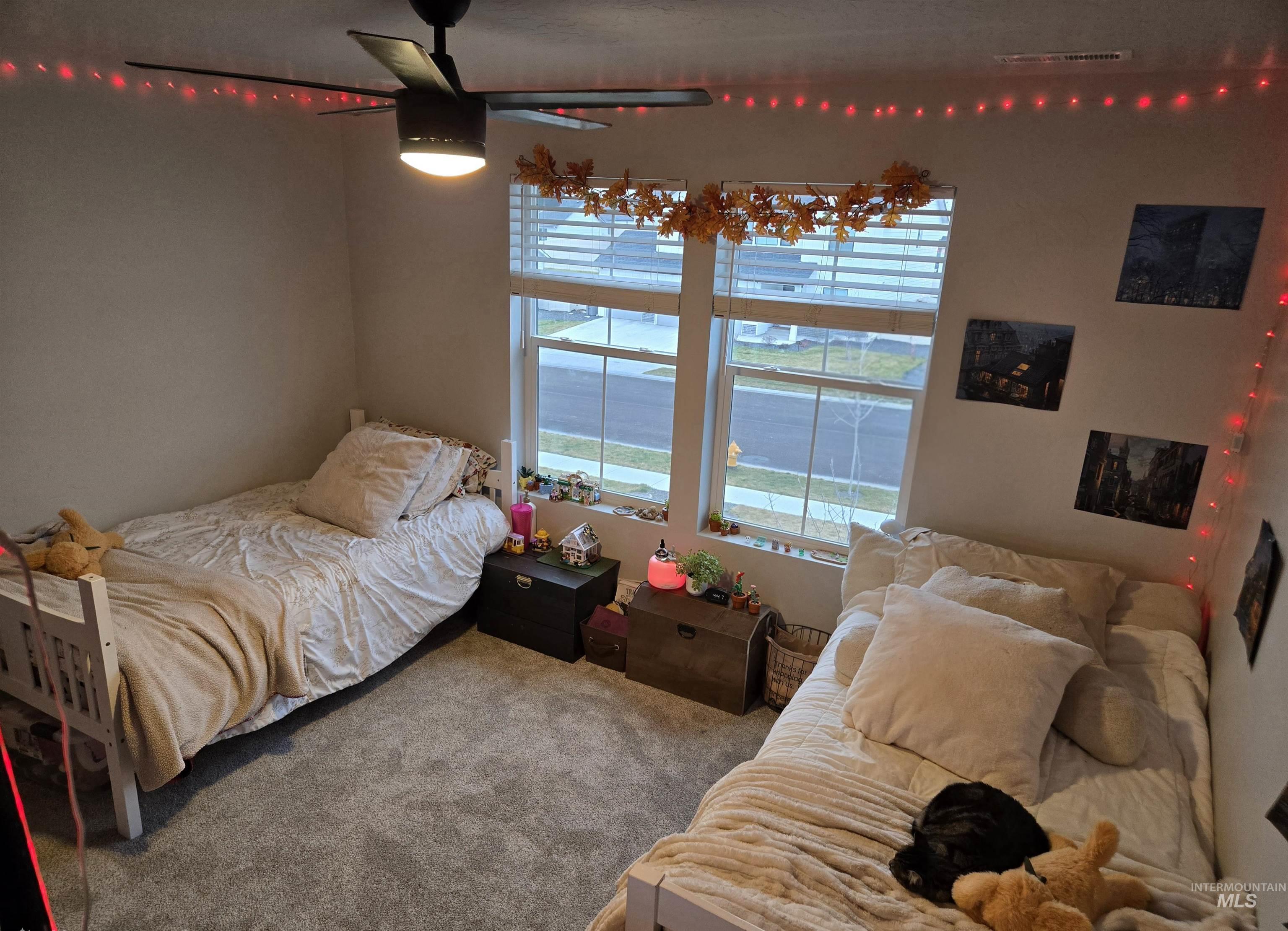 4098 East Mets Street Nampa, ID 83686 - Photo 28 of 34 Carpeted bedroom with a ceiling fan