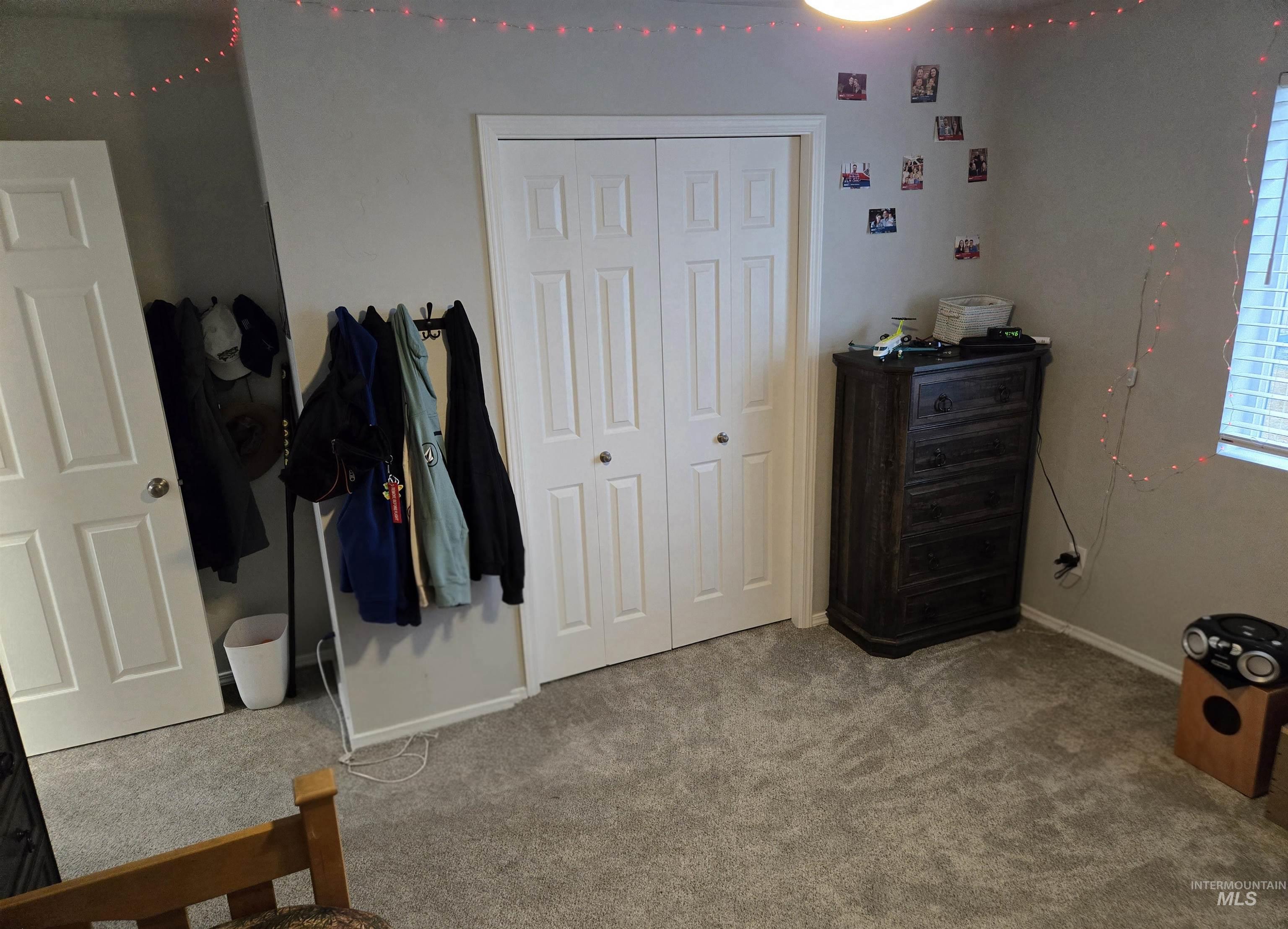 4098 East Mets Street Nampa, ID 83686 - Photo 30 of 34 Carpeted bedroom with a closet and baseboards