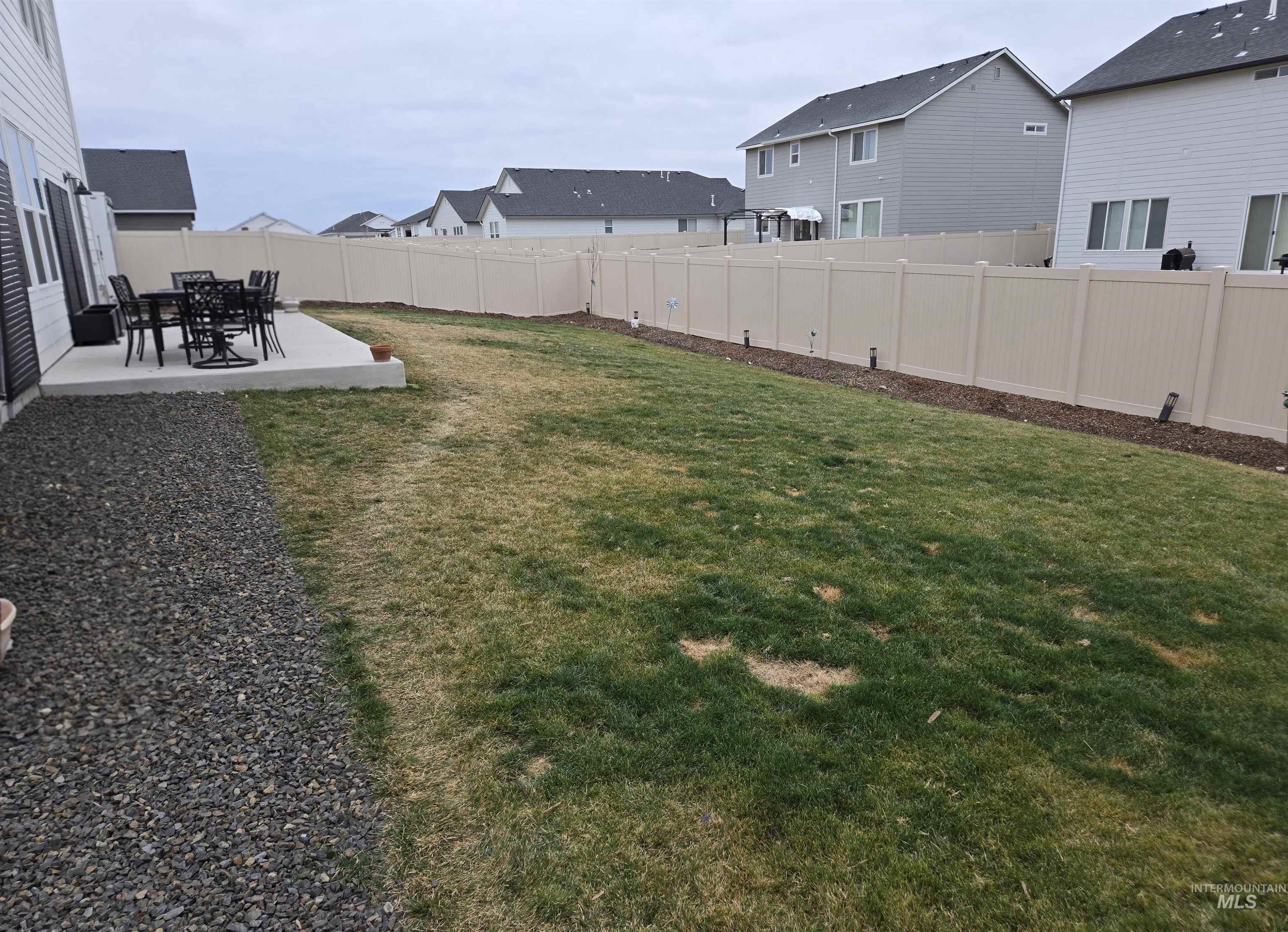 4098 East Mets Street Nampa, ID 83686 - Photo 34 of 34 Fenced backyard with a patio area