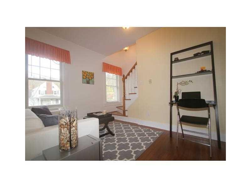 443 Walnut Road Pittsburgh, PA 15202 - Photo 12 of 25 Den. Cozy 12x8 Den on the main level. Steps on the far end ascend to the upper level Bedrooms.