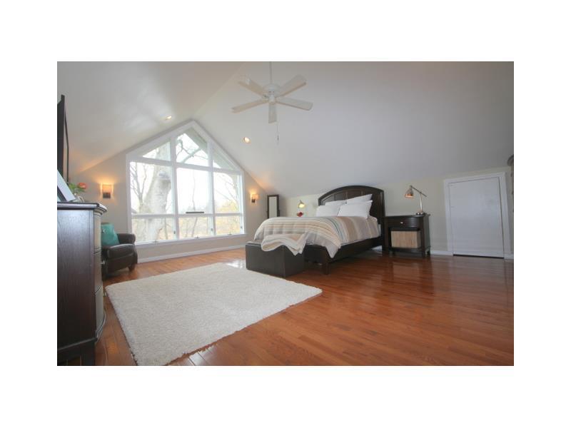 443 Walnut Road Pittsburgh, PA 15202 - Photo 13 of 25 Master Bedroom. Cathedral ceilings, hardwood floors and wall of glass with a fabulous view of the wooded back yard make this 19 x17 Master Bedroom a quiet and romantic retreat.