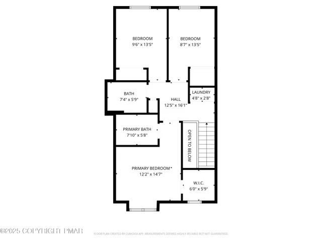 front view of a brick house with a yard