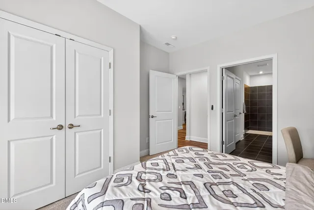 a bathroom with a double vanity sink mirror and