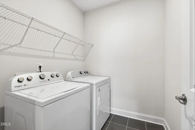 a view of a hallway view with wooden floor and windows