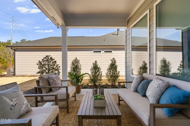 a outdoor living space with furniture and garden view