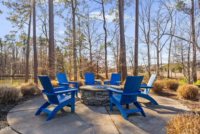 a row of pool tables and chairs