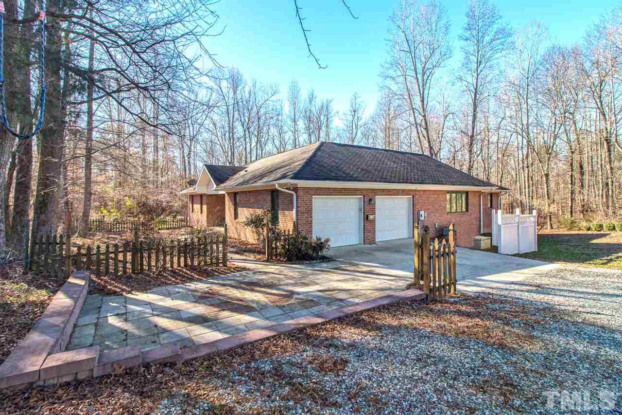 2319 Ira Road Efland, NC 27243 - Photo 25 of 25 Two car garage, along with additional gravel parking.