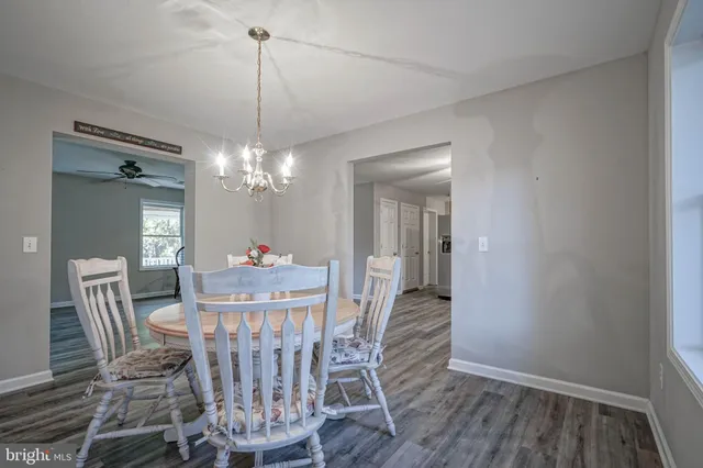 a kitchen with stainless steel appliances a refrigerator sink and microwave