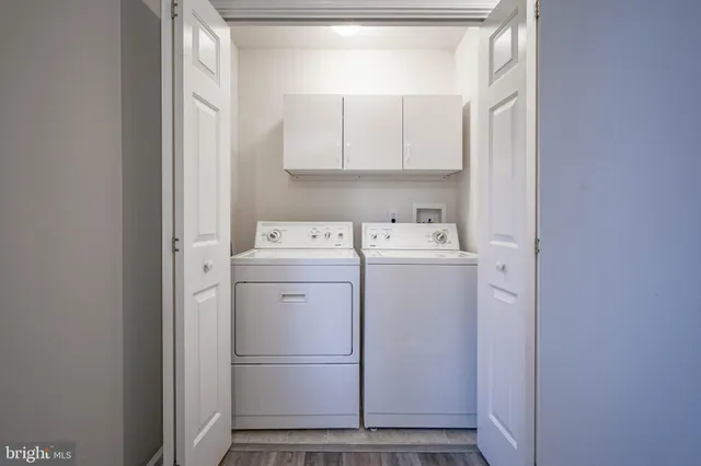 a view of workspace with furniture and window