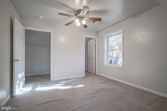 a view of a room with racks on the wall