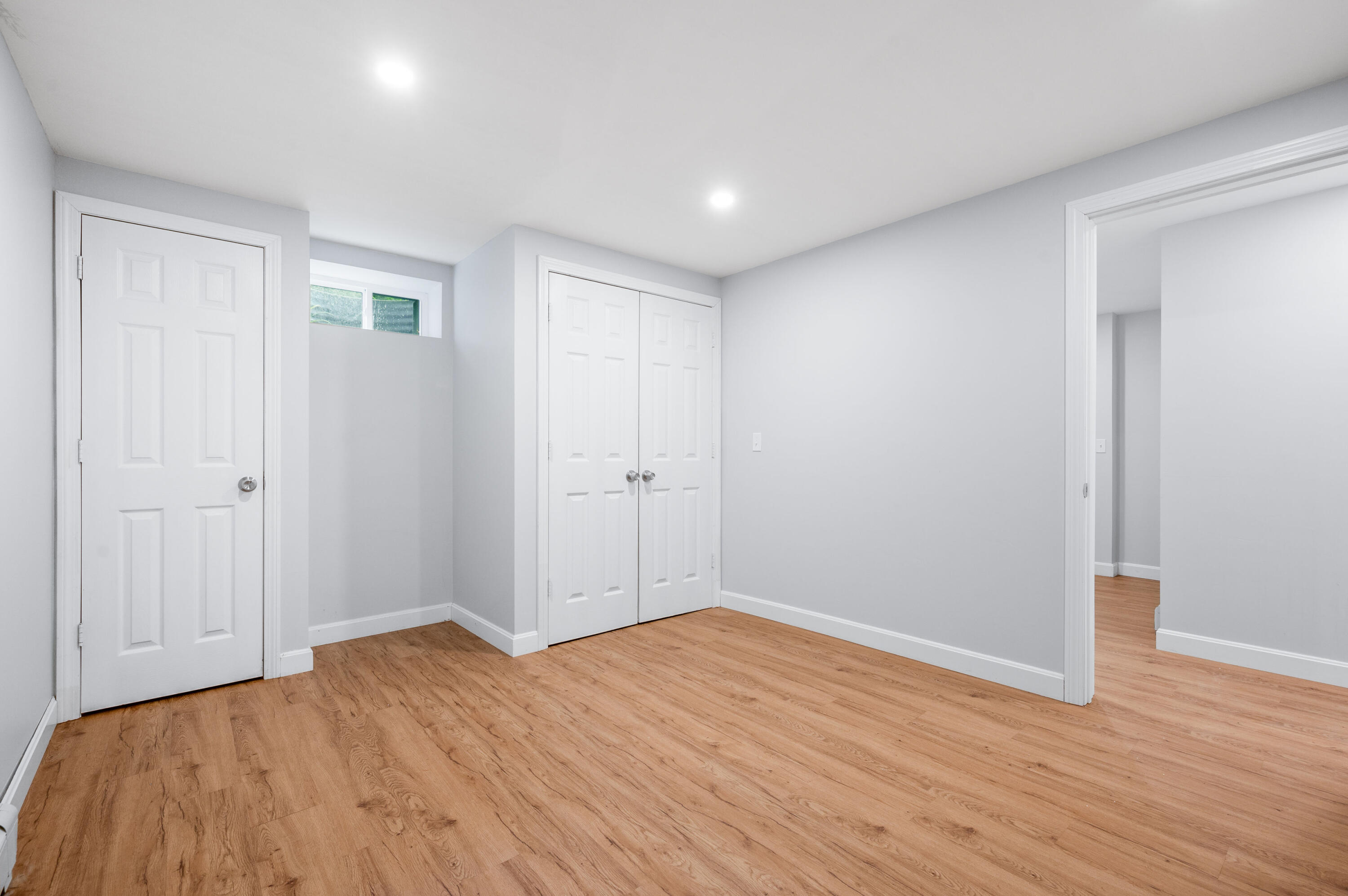 9 Tarragon Circle Cotuit, MA 02635 - Photo 18 of 28 a view of empty room with wooden floor
